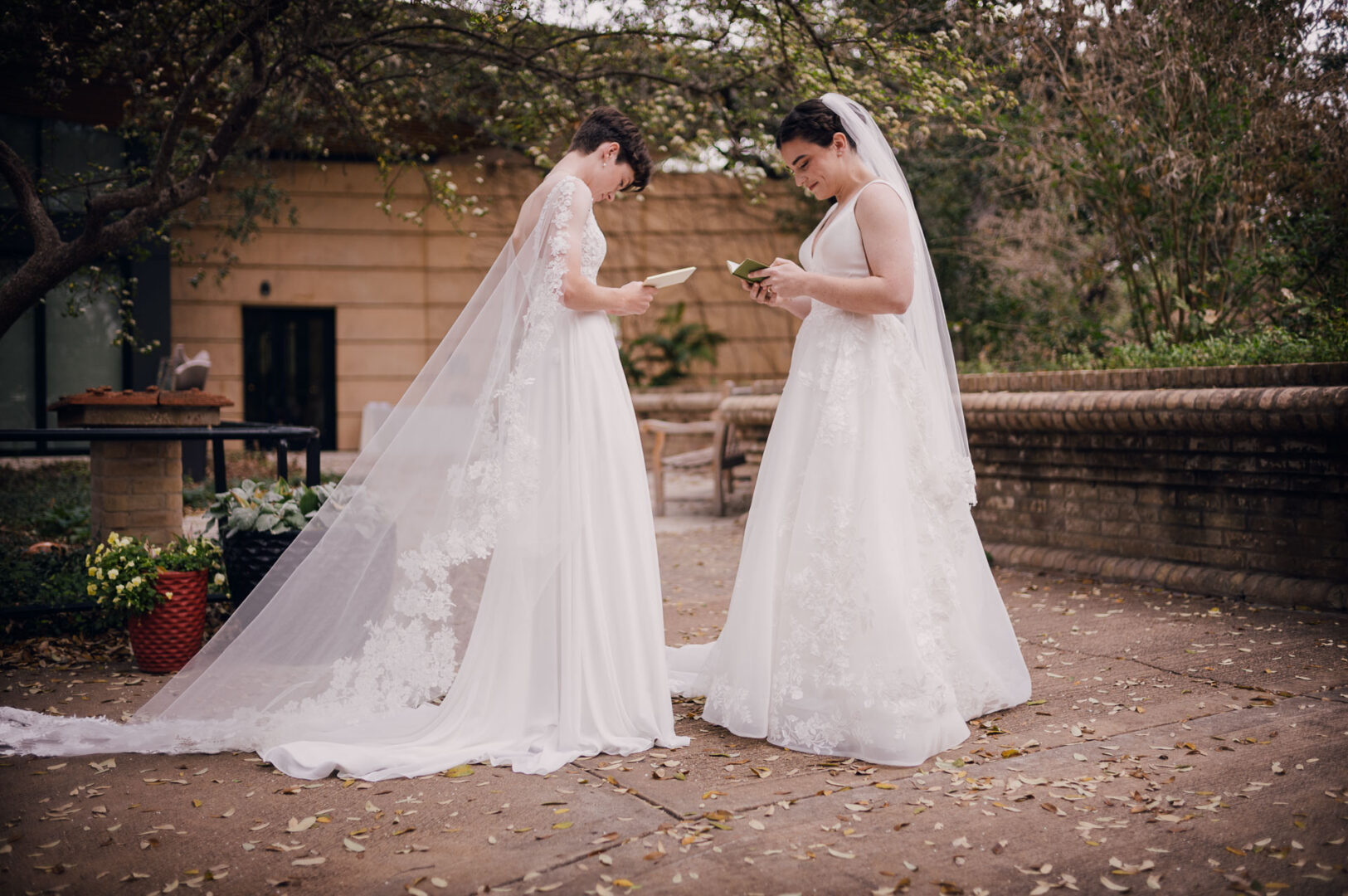 Winter Wedding at Botanical Gardens, San Antonio, Texas 9 Two brides exchanging vows outdoors.