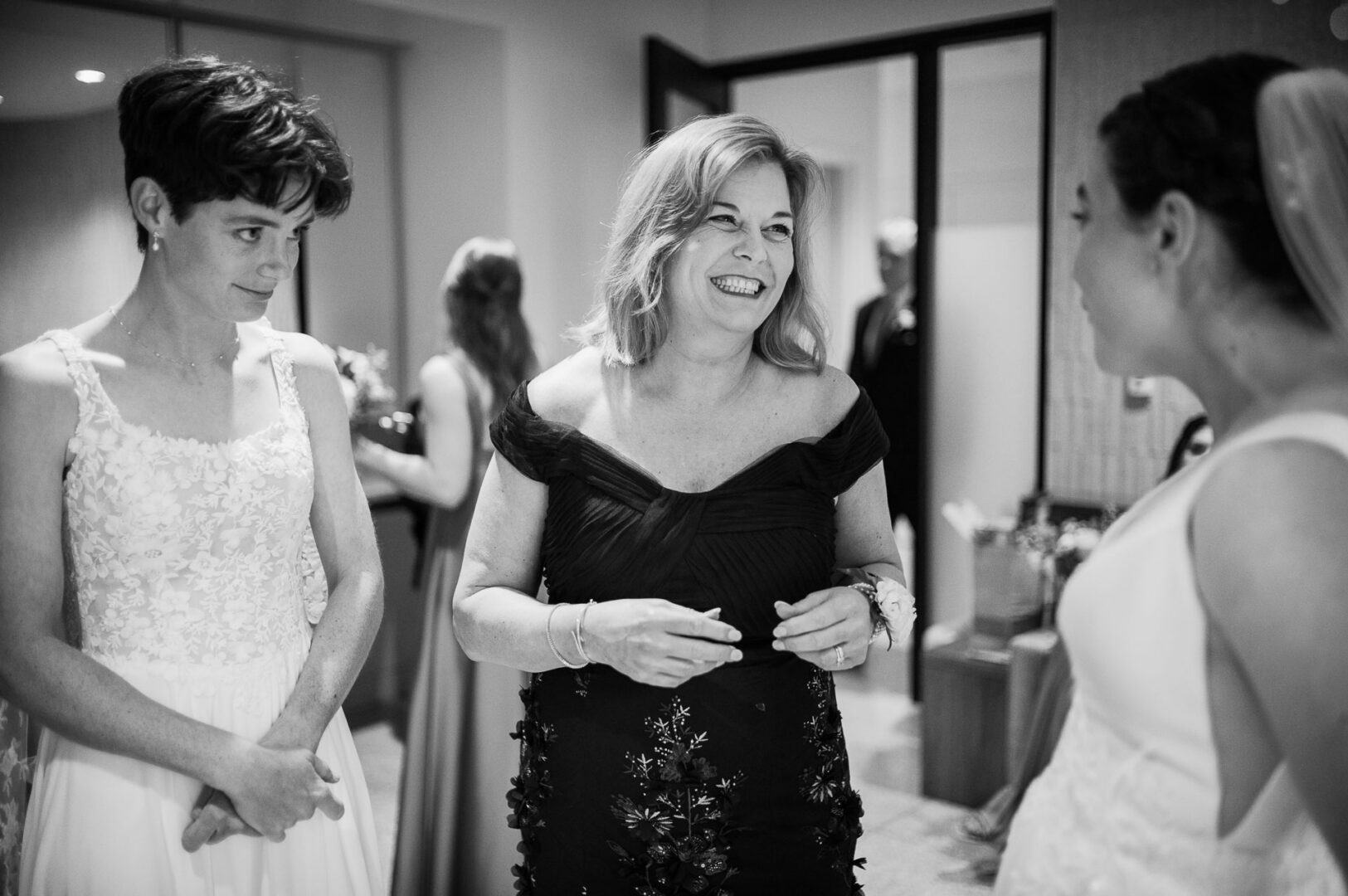 Winter Wedding at Botanical Gardens, San Antonio, Texas 14 Three women in wedding attire smiling.