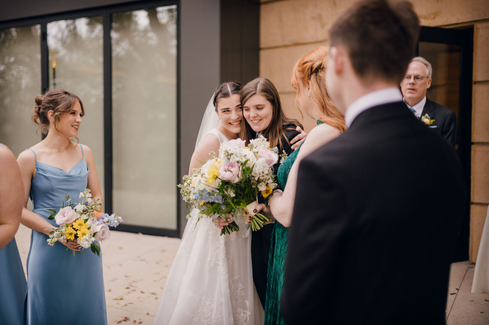 Winter Wedding at Botanical Gardens, San Antonio, Texas 31 Bridal party gathering with bouquets.