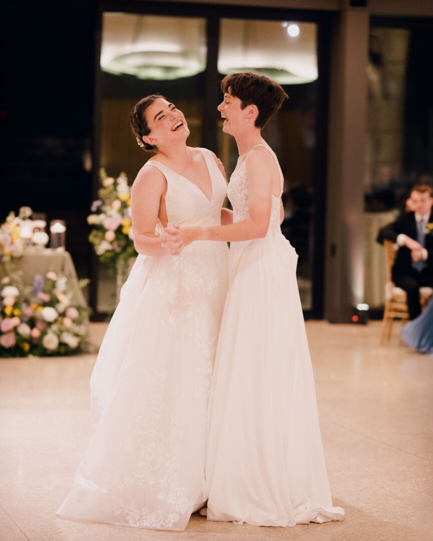Winter Wedding at Botanical Gardens, San Antonio, Texas 46 Two brides dancing joyfully together.