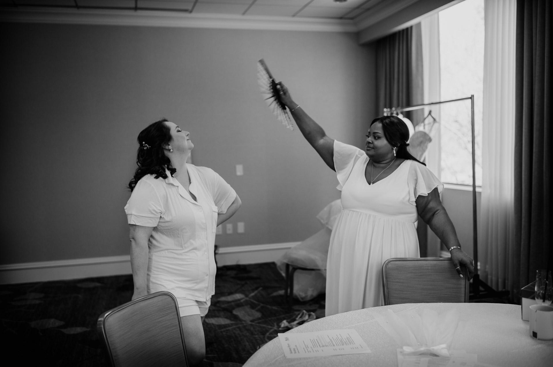 Oak Tree Ceremony & Candlelit Reception at The Houstonian 2 Bride and attendant taking a selfie during getting ready at The Houstonian Hotel.