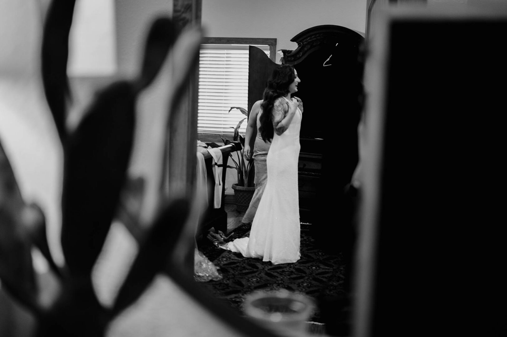 Vibrant Spring Wedding at Shiraz Gardens in Bastrop 5 Black and white documentary wedding image of bridal preparation reflected in a mirror at Shiraz Gardens.