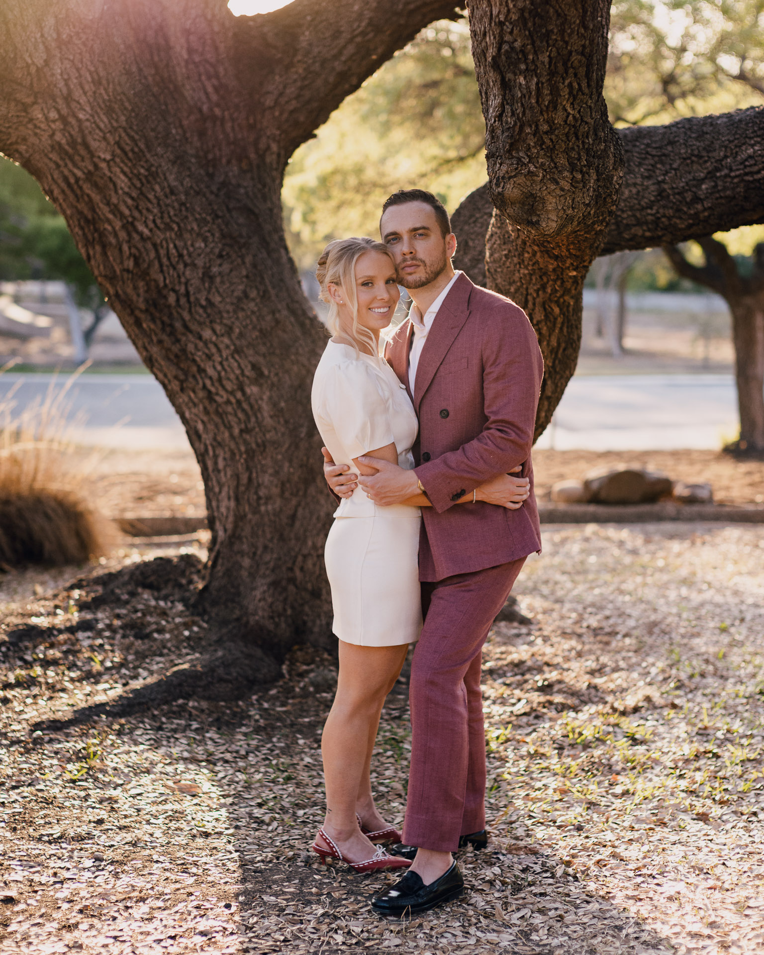 McNay Art Museum Couple embracing under a tree.