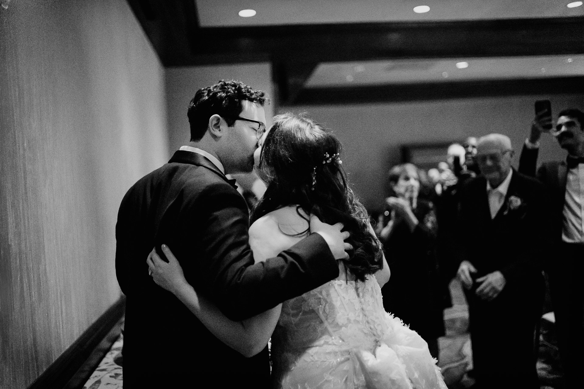 Oak Tree Ceremony & Candlelit Reception at The Houstonian 46 Bride and groom dancing together in a black-and-white reception moment.