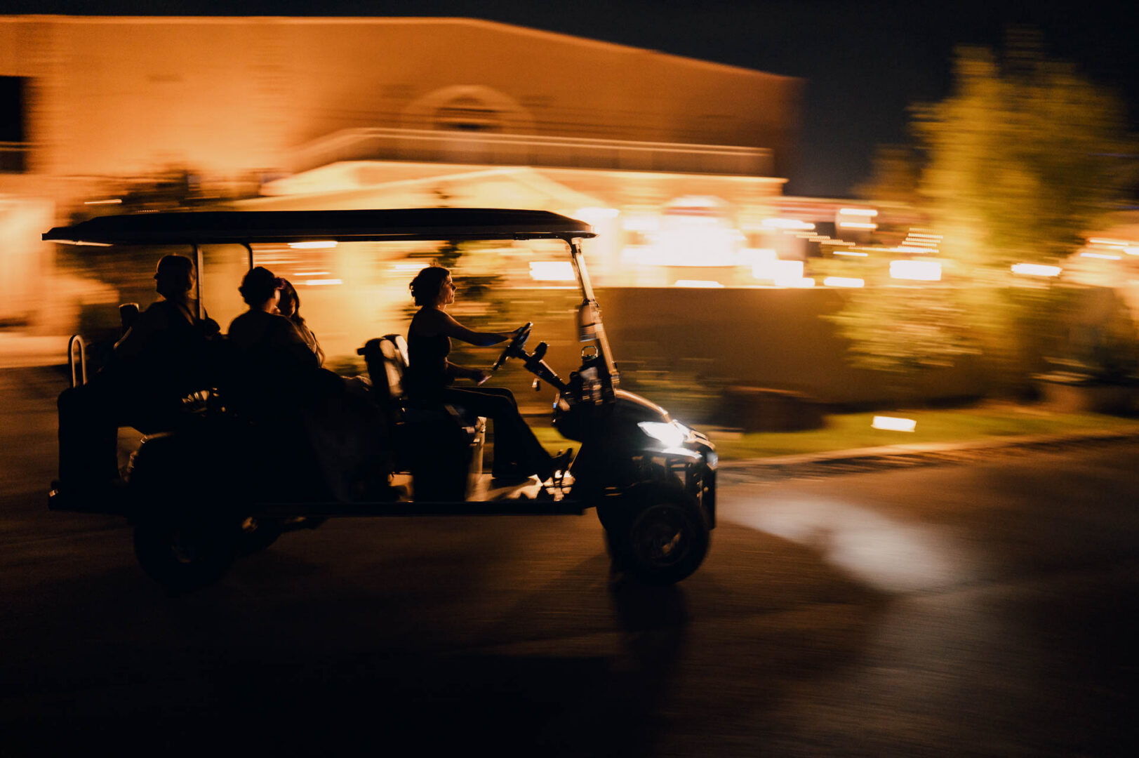 Vibrant Spring Wedding at Shiraz Gardens in Bastrop 74 Motion-blur documentary wedding photo of the reception energy and evening lights at Shiraz Gardens in Bastrop, Texas.