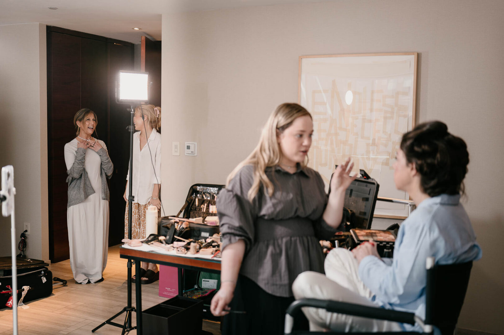 Bride during hair and makeup preparations in a Manhattan hotel room.
