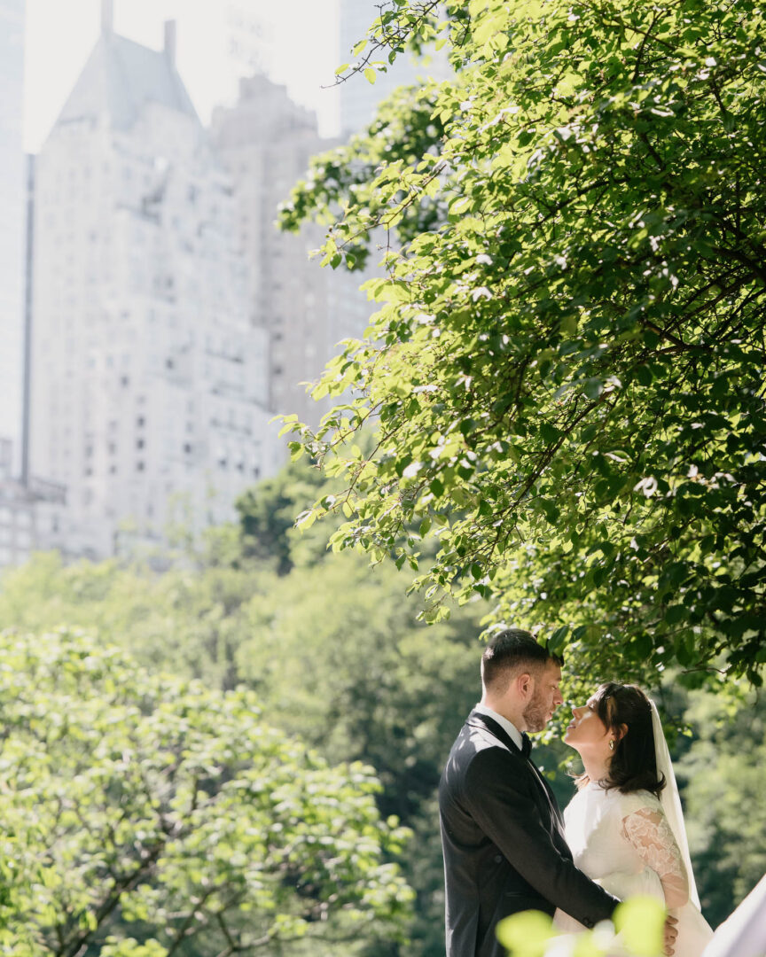 The couple in Central Park in soft spring light before the ceremony.