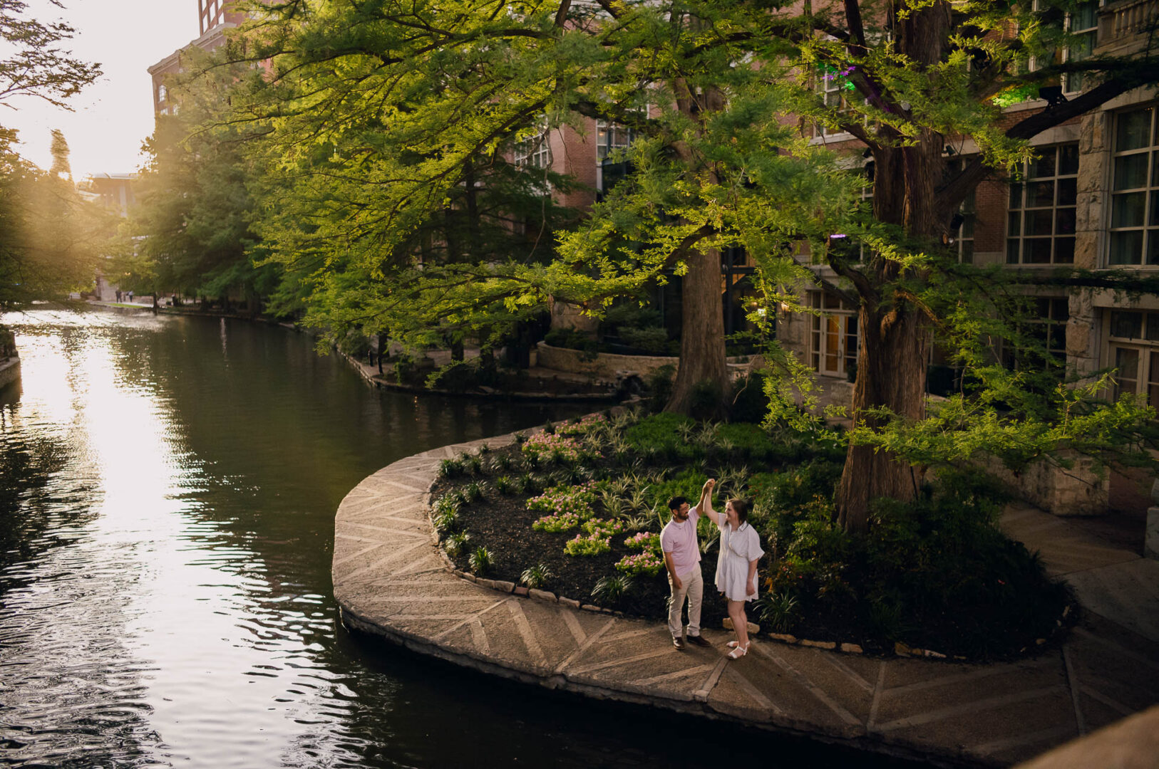 Couple enjoying a serene riverside moment.