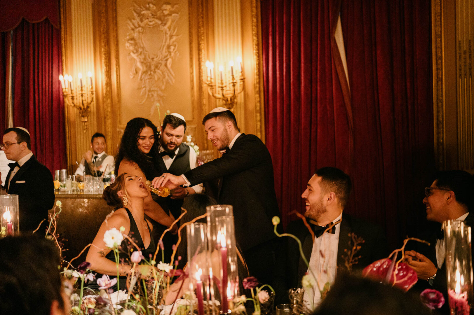 Wedding celebration with guests enjoying festivities.