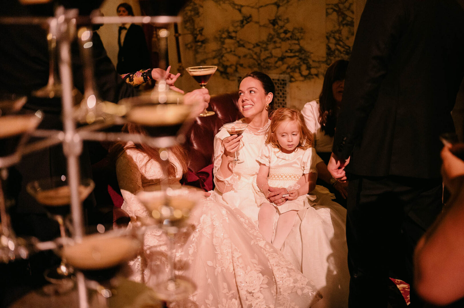 Bride with child at wedding celebration