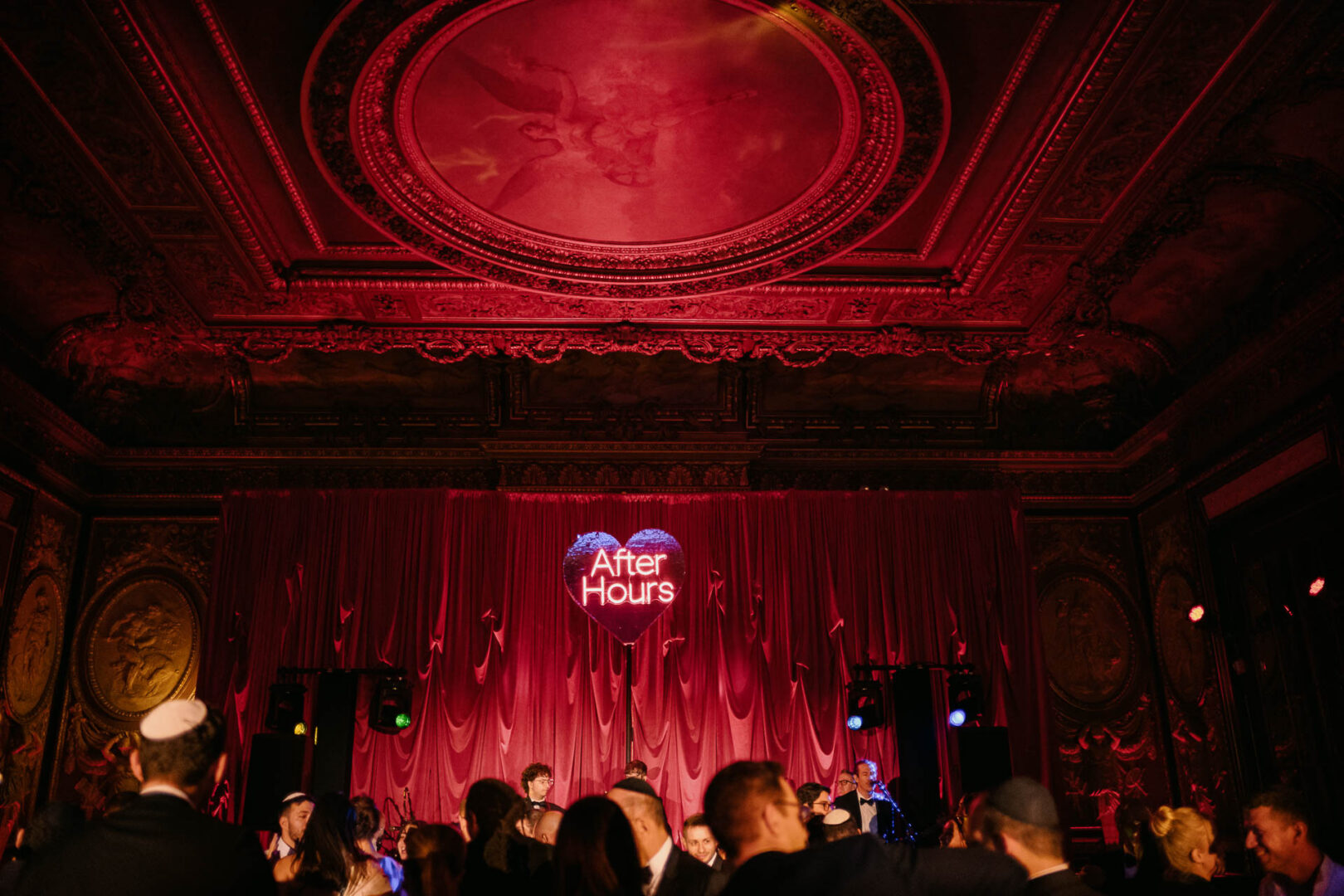 Elegant wedding reception with vibrant lighting