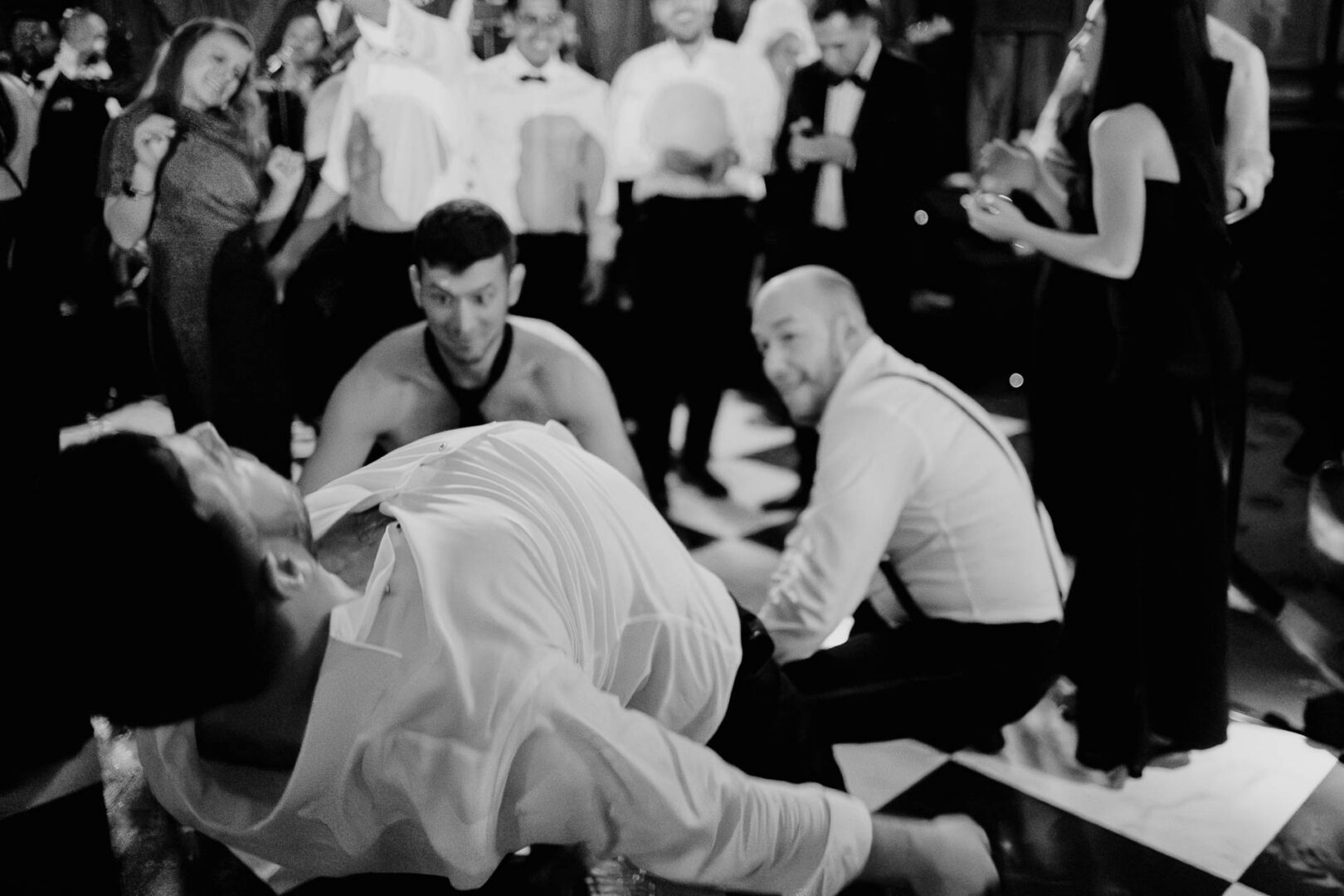 Wedding dance party with joyful guests