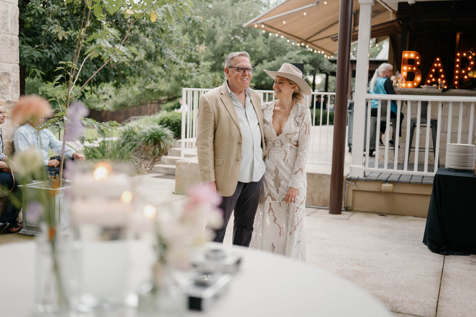 Wedding guests together on the porch of The Kendall in Boerne.
