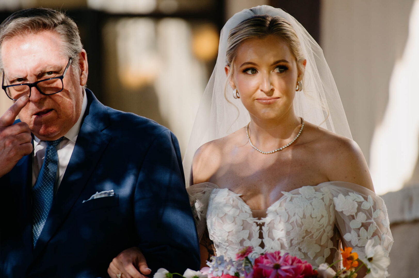 Bride with father walking down the aisle