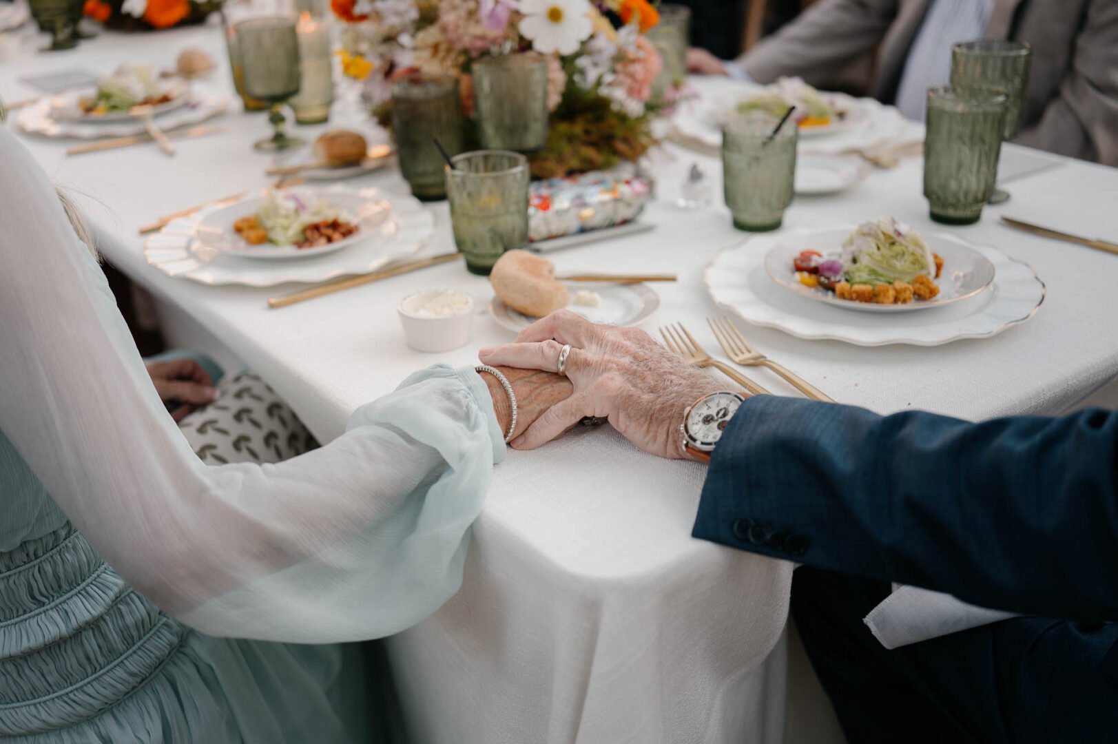 The Kendall Wedding — Reception table hands with guests seated at The Kendall.