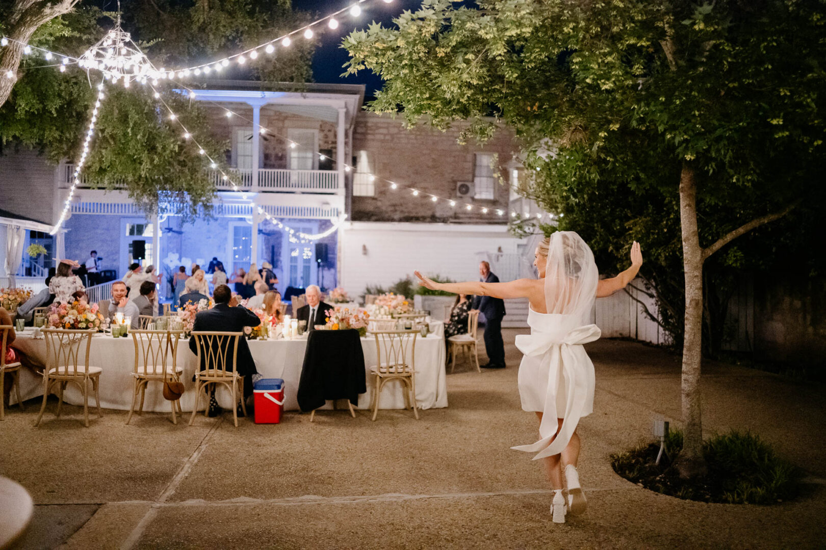 Night reception courtyard with string lights at The Kendall in Boerne.