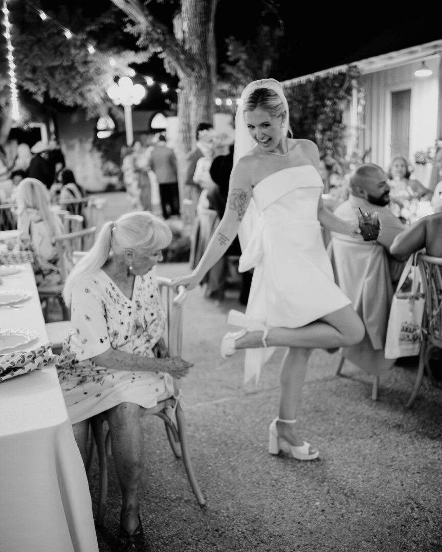 Bride laughing with guests during the reception at The Kendall.