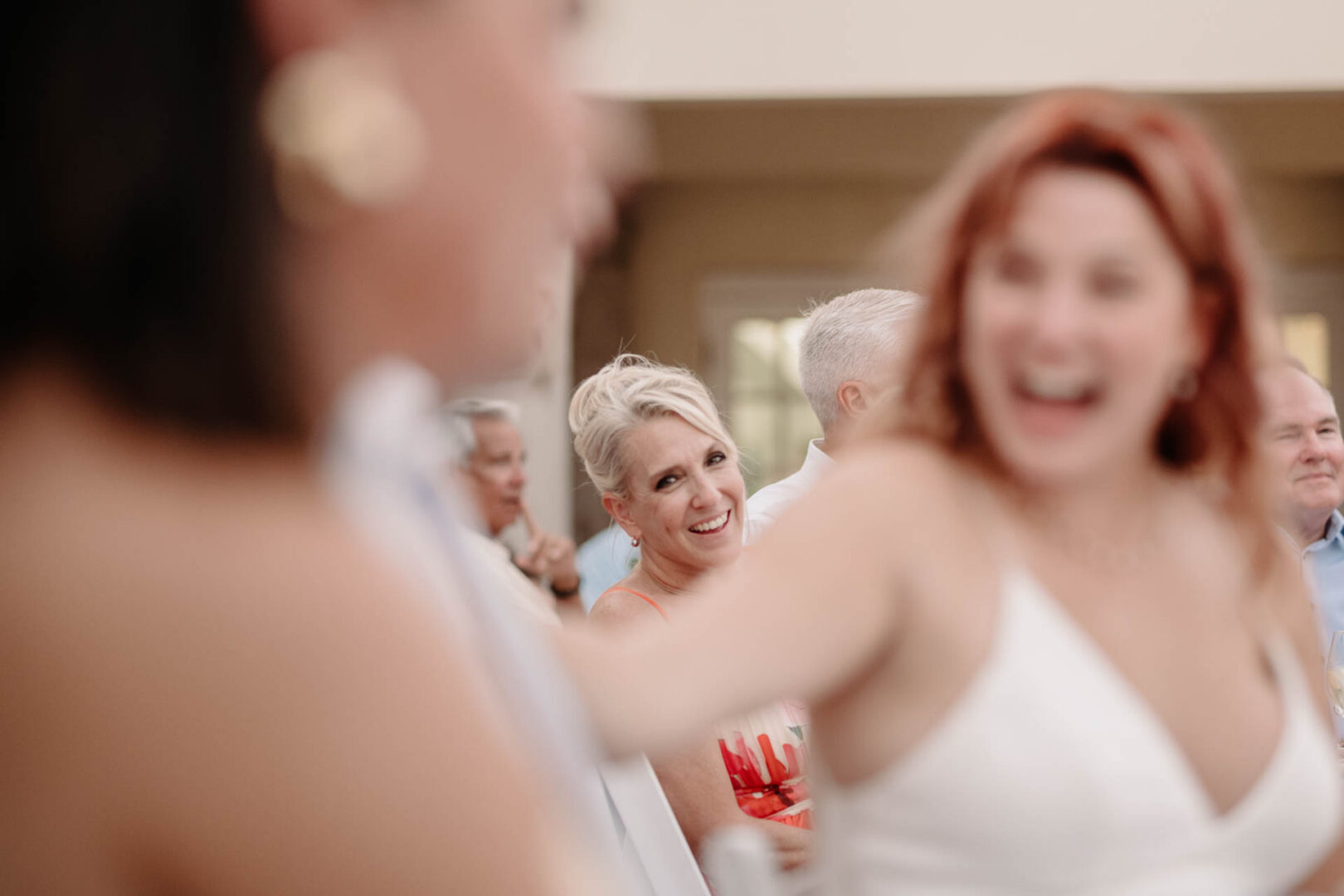 Chapel on the Dunes Wedding | Port Aransas, Texas | Mady+Roland 56 Joyful moments at a wedding reception with mother of the bride.