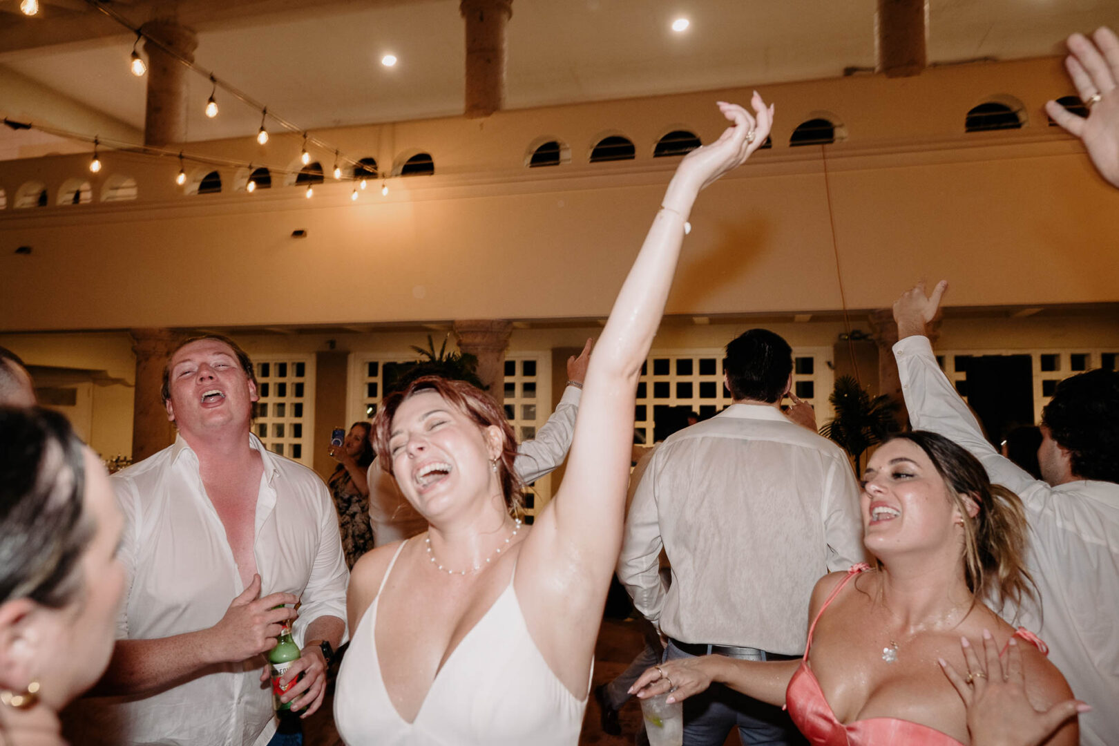 Chapel on the Dunes Wedding | Port Aransas, Texas | Mady+Roland 66 Celebration with dancing and joy