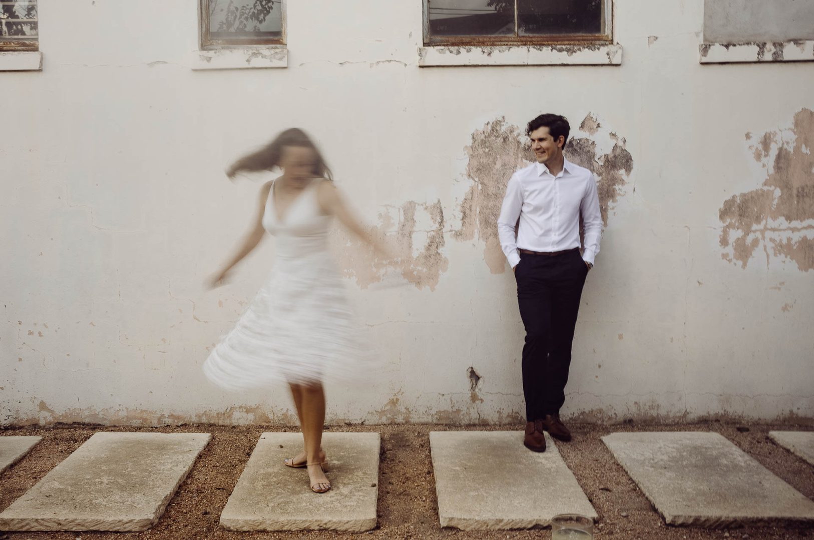 Couple enjoying playful engagement session.