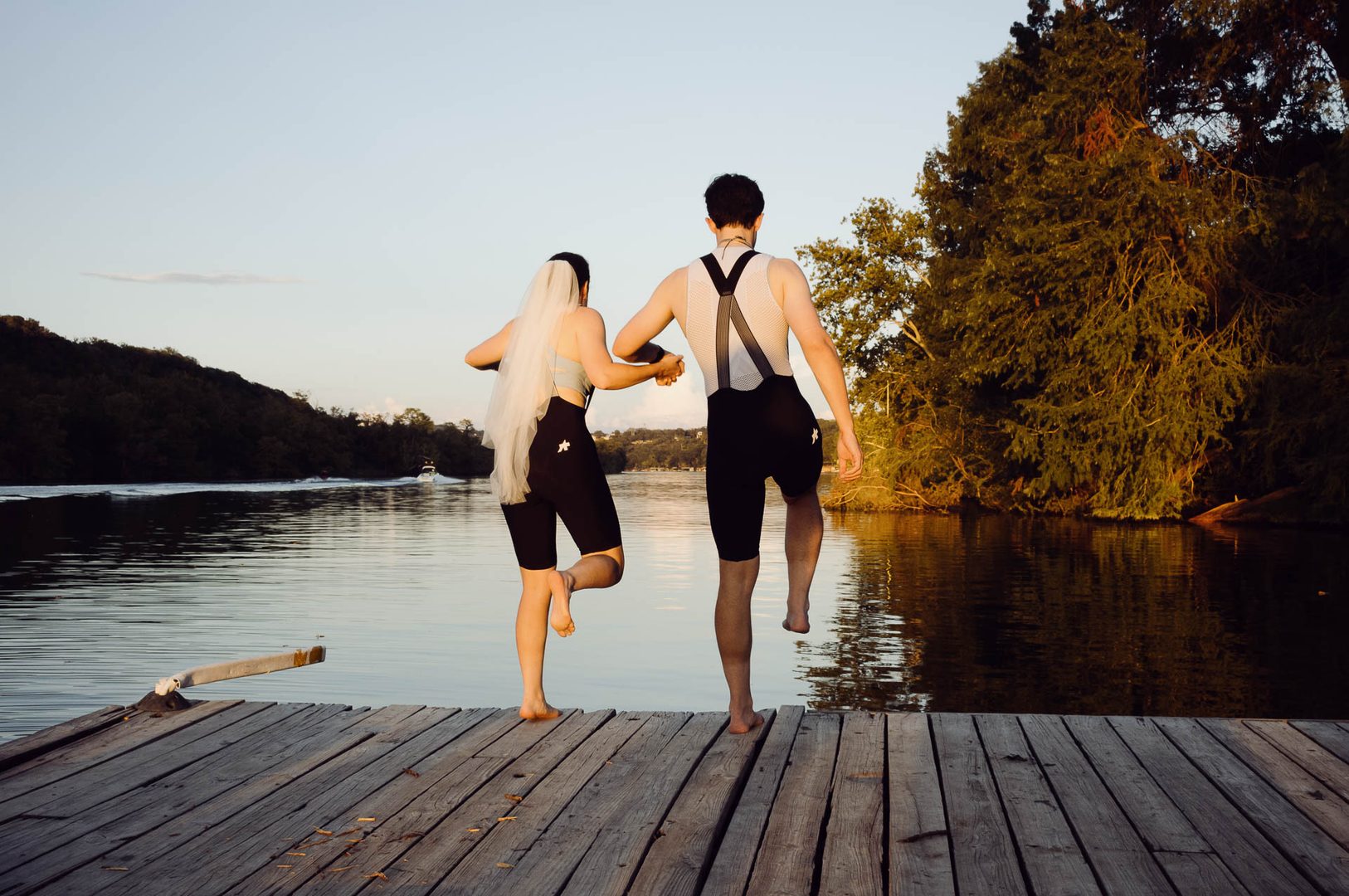 Couple walking by the water.