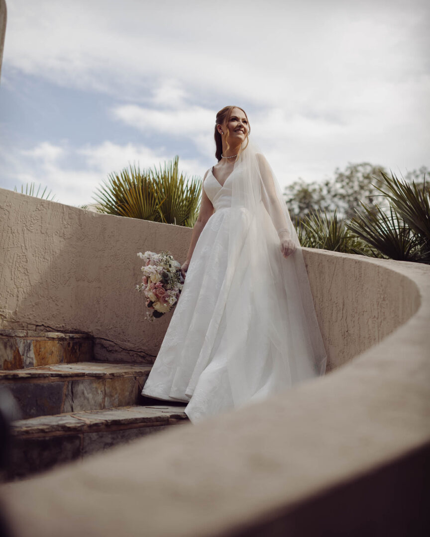 Tapatio Springs Hill Country Resort | Luana + Mack | Helotes 13 Bridal Portrait on steps at Tapatio-Springs-Hill-Country-Resort